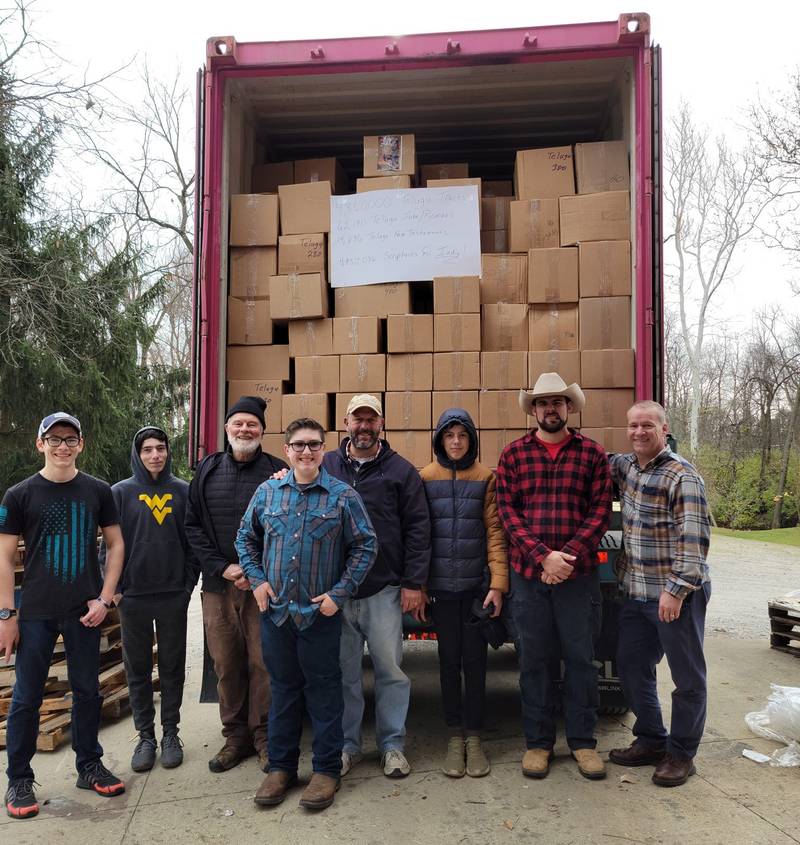 Church members loading Scriptures for missions